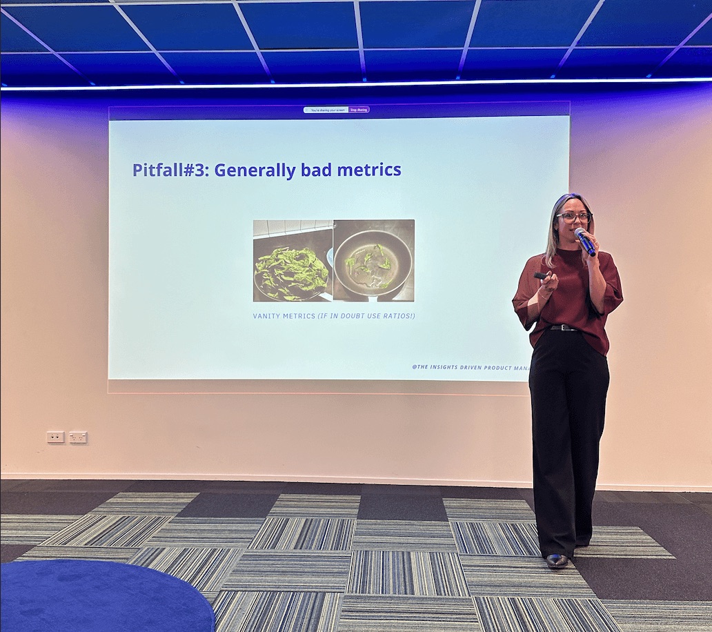 Corinna presenting product metrics pitfalls